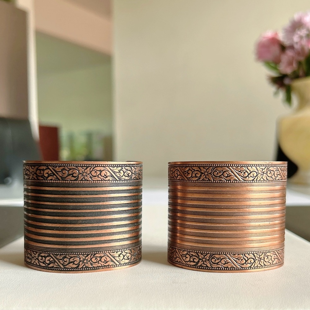 Two (2) wide copper cuffs